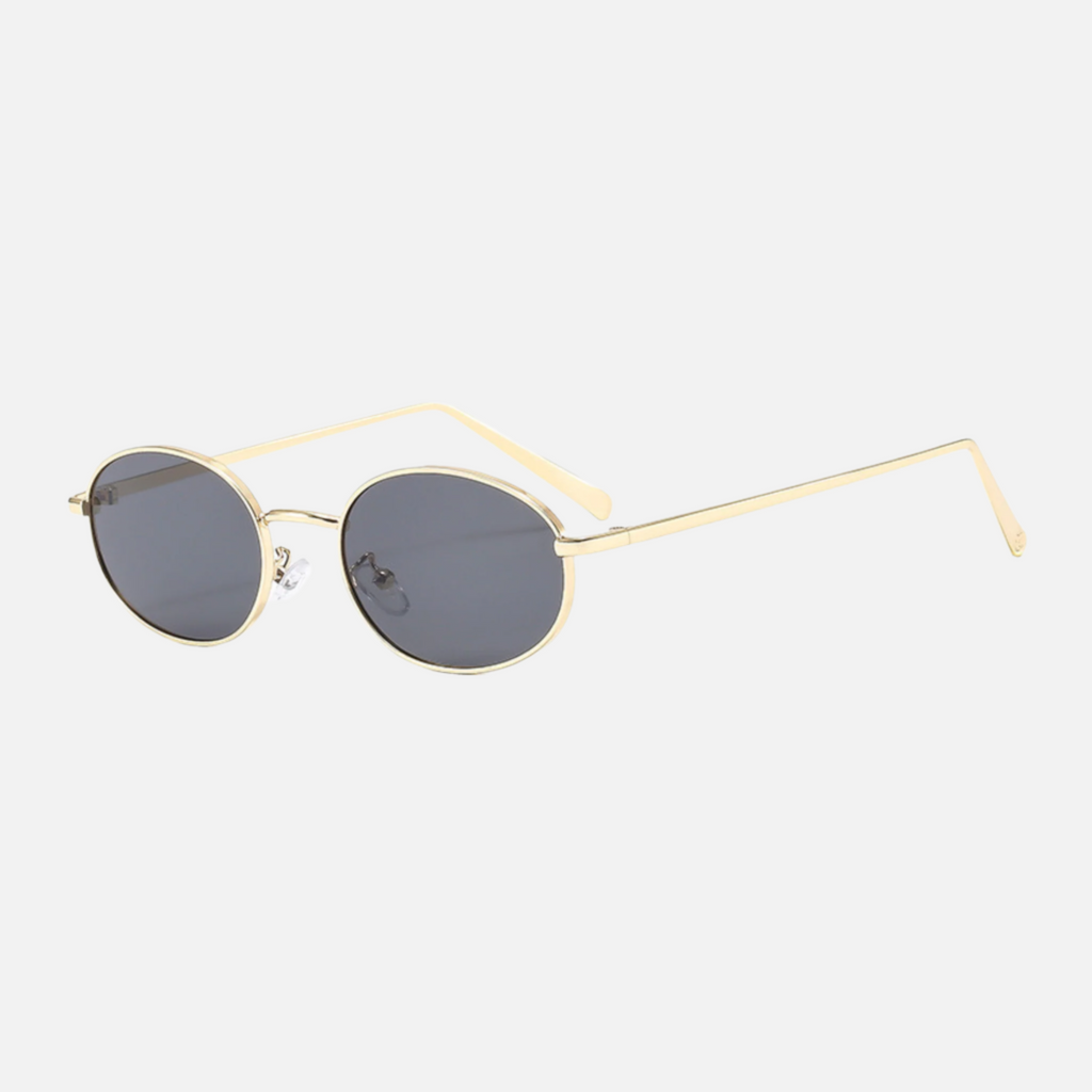 "Chloe gold smoke sunglasses 70s inspired slim metal frame"
